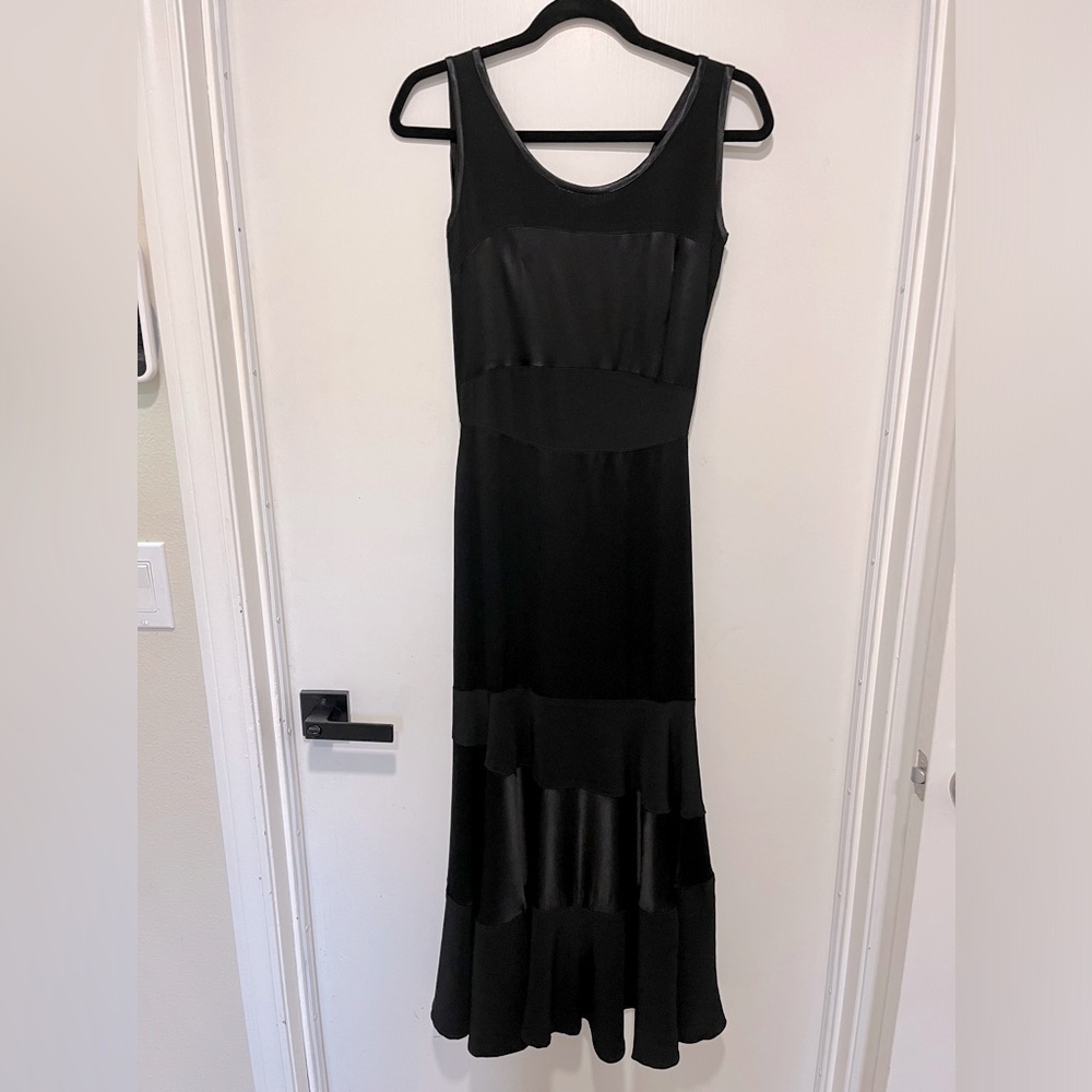 Vintage- Lovely European black evening dress featuring satin and crepe panels.